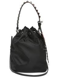 Find everything from backpacks to belt bags and enjoy ✈ express shipping & free returns miuccia prada may not have invented nylon but she certainly made it iconic. Prada Synthetic New Vela Nylon Bucket Bag W Studs In Black Red Black Lyst