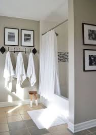 For a creative towel display idea, mount a set of wicker baskets on the wall above the vanity to use as floating shelves. Cute Towel Hooks For Bathroom Off 55