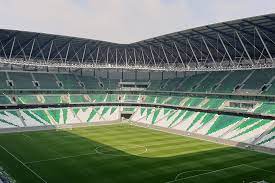 Education city stadium takes the form of a jagged diamond, glittering by day and glowing by night. Education City Stadium