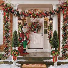 Outdoor purple, yellow, rose and lime latex balloon column with foil star topper. 56 Amazing Front Porch Christmas Decorating Ideas