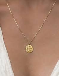 Christopher is the patron saint of travelers and back in the day, sailors originally wore them for safe passage at sea. Leah Alexandra St Christopher Necklace Adorn Boutique