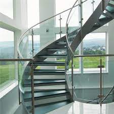 Glass railing easily highlights clean architectural lines, minimalist aesthetic, and open space and feel. China Modern Design Interior Curved Glass Staircase With Tempered Glass Railing China Curved Staircase Glass Staircase