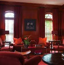 The main color is red and this had been used for the accents, the rubbish bin, the toilet brush, flower vases, and the remaining areas have used tints of red (added white) creating a pinker shade for the tiles and drapery fabric. Red Monochromatic Living Room Monochromatic Living Room Interior Design Masters Interior Design