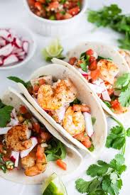 Place fish on a large plate. Sheet Pan Shrimp Tacos With Pico De Gallo Recipe The Rustic Foodie