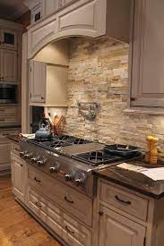 Properly sealed, this material won't stain, absorbs heat, and gives your kitchen a beautiful and sophisticated finish. 10 Stone Backsplash Ideas To Bring The Beauty Of Nature Inside
