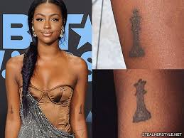 More king and queen tattoos that feature the king and queen of hearts right here! Justine Skye S 19 Tattoos Meanings Steal Her Style
