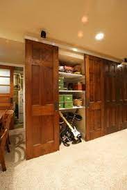 Unique Basement Design Ideas Pictures Remodel And Decor Basement Storage Cabinets Basement Renovations Basement Storage Closet