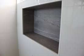 When remodeling a bathroom, consider adding a recessed shower shelf into your design. Shower Nox In Wall Shower Niche Shower Alcove Beautiful Bathroom Renovations