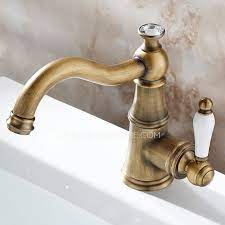 Single handle centerset bathroom faucet. Single Hole Antique Brass Porcelain Handle Bathroom Faucets Sink Faucets Bathroom Faucets Antique Brass Bathroom Faucet