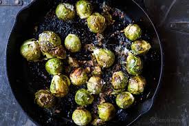 The Best Way To Cook Brussels Sprouts Roasted Like Popcorn They Re So Addictive With Garlic Sprout Recipes Brussels Sprouts Recipe Roasted Brussel Sprouts
