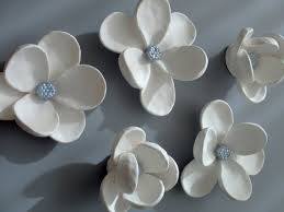 Ceramic wall flowers are easy to achieve with some practice. Custom Order Five Blooms White Petals Light Blue Centers Ceramic Flower Wall Art Ceramic Flower Blooms Ceramic Flowers Ceramic Wall Art Flower Wall Art