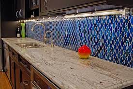Glass mosaic tiles which can be see through so it gets the name as crystal, but with the color paints on the back of the mosaic tiles makes thousands of colors are possible. Cobalt Blue Backsplash Adds Artistic Flair To Kitchen Hgtv