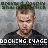 Titusville police catch serial burglar fleeing with cigarette packs