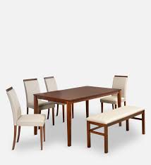 An attractive table adds to the environment of a meal. Buy Pearl 6 Seater Dining Set With Bench In Cappucino Color By Home Online Contemporary 6 Seater Dining Sets Dining Furniture Pepperfry Product