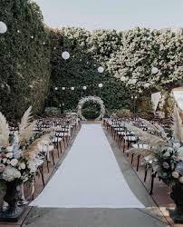 The Wed List On Instagram An Outdoor Ceremony That Caught Out Hearts Away Loving The Pamp Wedding Aisle Decorations Outdoor Ceremony Mountain Wedding Photos