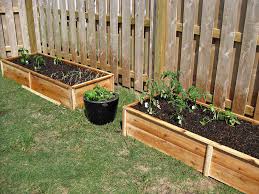 This diy raised garden bed fence is removable so you can tend to your plants comfortably, without the walls in the way. Ten Dollar Cedar Raised Garden Beds Ana White