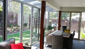 Interior design ideas for sunrooms spring up from most magazines that deal with home and garden sunroom decorating can vary from the order off the shelf fancy designs to d.i.y. A Glass Sunroom Extension For Year Round Enjoyment Suncoast Enclosures