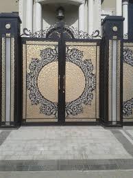 The professionals have used natural wood and stainless steel to produce a robust structure. 50 Modern Main Gate Design Design Ideas Everyone Will Like Engineering Discoveries In 2021 Iron Gate Design Main Gate Design Modern Main Gate Designs