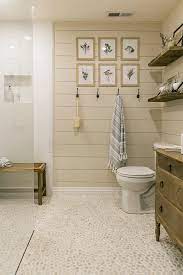 It includes a soaking tub and a white vessel sink vanity with a mirror lighted by vintage crystal sconces. Beach Cottage Bathroom Ideas Decor You Ll Love Cottage Bungalow