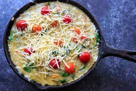 Saute the zucchini and onion until tender and lightly browned, about 20 minutes. Zucchini Spinach Frittata With Mini Heirloom Tomatoes Trial And Eater