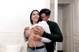 Curvy Raven Haired Fuckdoll Mary Bambola with Fake Tits Wearing Ripped Jeans  in Bed Playing With Vibrator - Image Gallery 610033