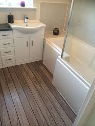 Bathroom Black And White Laminate Flooring This White Bathroom Furniture Looks Great Alongside The Wooden Laminate Flooring By Fiona From Annan Vpshareyourstyle White Bathroom Furniture Small Bathroom Bathroom Interior