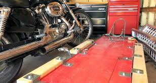 Sloped, to facilitate mounting the motorcycle on the lift, and flat, to serve as a work surface after pivoting. How To Diy Motorcycle Table Lift Side Extensions Youmotorcycle