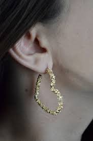 Buffed to a brilliant luster, these hoop earrings secure comfortably with hinged backs. Gold Nugget Heart Earring Valentine S Day Earrings Etsy In 2021 Heart Earrings Earrings Etsy Earrings