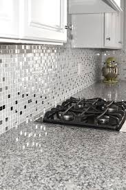Blue pearl granite with 3/8 edging, a 50/50 sink with a 4″. 5 White Glass Metal Backsplash Tile Luna Pearl Granite Countertop