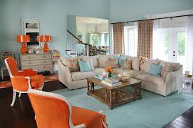 Softly sophisticated, modern coastal, organically inspired fine art & design, gracing select home decor lines, created by designer shell. Coastal Aqua Living Room With Bold Orange Accents Hgtv