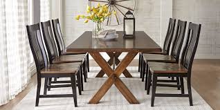 The classic combination of black and brown dining room sets is the ideal choice for a range of styles. Black Brown Dining Room Sets