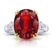 The moussaieff red diamond (formerly known as the red shield diamond) is a diamond measuring 5.11 carats (1.022 g) with a triangular brilliant cut (sometimes called a trillion or a trilliant cut), rated in color as fancy red by the gemological institute of america. 6 66 Carat Oval Red Spinel And Diamond Ring David Gross Group