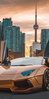Golden Lamborghini Aventador Cn Tower 1080x2160 Wallpaper Lamborghini Aventador Best Luxury Cars Car Wallpapers