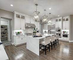 Neutral tones are still used, but the latest. Waterfall Island Pascal Model Home Gourmet Kitchen Hayward California Richmond Ame Modern Kitchen Design Kitchen Design Decor Kitchen Inspiration Design