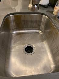 completely dry kitchen sink. the stains