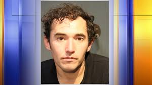 Sioux City man accused of attempting to bite police officer's arm during  arrest