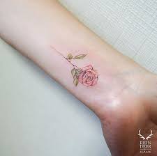 The Most Adorable Little Rose Tattoo Ever Tiny Wrist Tattoos Small Wrist Tattoos Wrist Tattoos