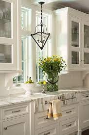 If you don't prime the oak portions of the cabinets, the orange will show through. Adding Wood Trim To Kitchen Cabinets