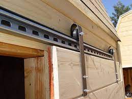 Make Sliding Barn Doors Using Skateboard Wheels Diy Sliding Barn Door Barn Doors Sliding Barn Door