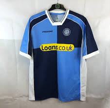 The chairboys' 13/14 home jersey uses wycombe's trational quartiles in the club's light blue and black on its front torso. Wycombe Wanderers Home Football Shirt 2005 07 Adults Xl Prostar Historic Football Shirts