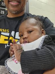 Look who coach E has at the gym. She was cranky at first, but now we  besties. That's my lil cousin.