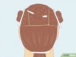 While the rollers are heating up, divide and clip dry hair into four large sections—one over each ear, one in the back and one on top. 3 Ways To Use Hair Rollers Wikihow