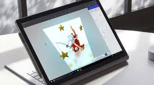 Surface Book 2 With Surface Pen Attached To The Side And A Surface Dial On The Right On A Table Microsoft Surface Book Microsoft Surface Microsoft