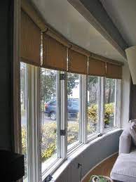 Window Covering Ideas For A Large Bow Window Window Treatments Living Room Bow Window Living Room Bay Window Treatments