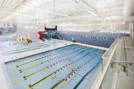 The Smith Aquatic Fitness Center Features A Six Lane Competition Pool And Family Recreation Pool Aquatic Design Indoor Swimming Pools Design Indoor Family