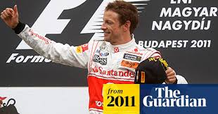 The hungarian grand prix held on hungaroring. Jenson Button Holds Off Sebastian Vettel To Win Hungarian Grand Prix Formula One 2011 The Guardian