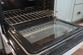 Rather than giving up and disguising the messy glass by hanging dishtowels, maneuver your way between the doors. How To Clean Inside Your Oven Door Pretty Handy Girl