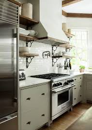 White shaker kitchen cabinets paired with black kitchen island. Black Hardware Kitchen Cabinet Ideas The Inspired Room