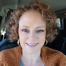 What mid-size SUV has enough cargo space and lower passenger seat for  wheelchair transfers?