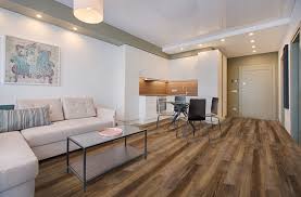 The same wood finish also ties the spaces together: 2021 Kitchen Flooring Trends 20 Kitchen Flooring Ideas To Update Your Style Flooring Inc